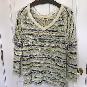 Free people sweater with Vneck.